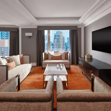 Brisbane Marriott Hotel Exterior photo A living room in a suite at the Mandarin Oriental, New York